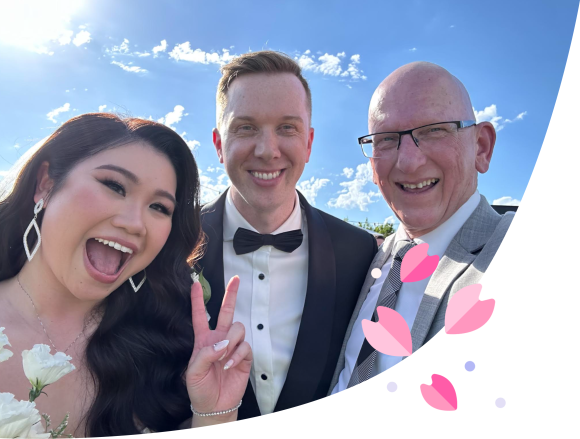 Image of celebrant, Craig Anderson, with a beautiful couple